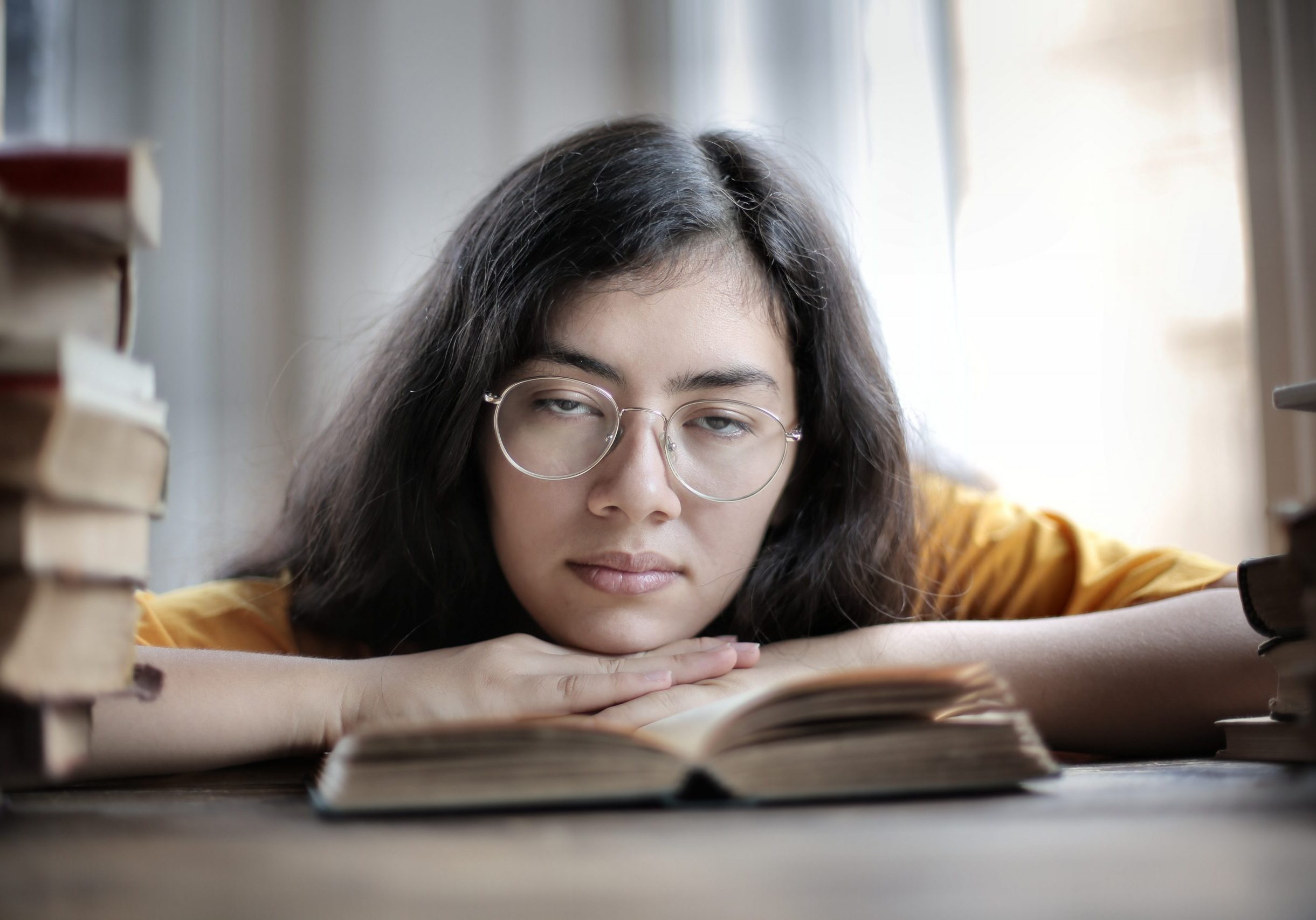 Tired face on book Tired face on book